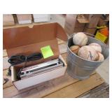 black light & bucket w/softballs