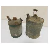 2 smaller galvanized gas cans