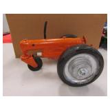 orange metal art tractor