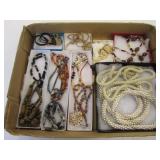 flat of costume jewelry