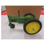 green metal art tractor