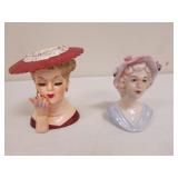 2 lady head vases