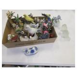 flat of bird figurines