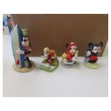 4 disney figurines