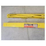 yellow metal saw horses