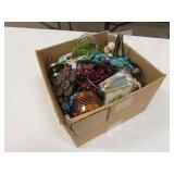box of costume jewelry