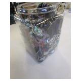 container of costume jewelry