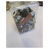 container of costume jewelry