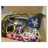 box of costume jewelry
