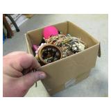 box of costume jewelry