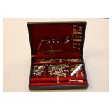 box of military insignia & mens jewelry
