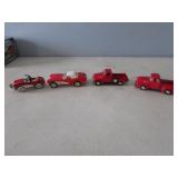4 toy trucks & cars w/extra box
