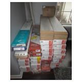 32 boxes of same wood flooring & 3 odd boxes