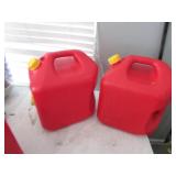 two 5 gallon gas cans