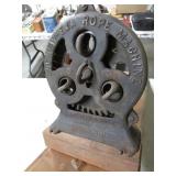antique rope machine on stand