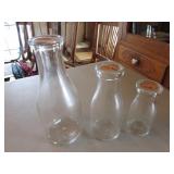 3 milk bottles