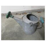 galvanized sprinkler can