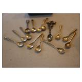 14 small silver spoons