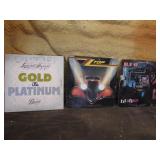 3 records incl:zz top & lynard skynard
