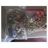 2 bags of costume jewelry