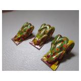 3 old toy frog clickers