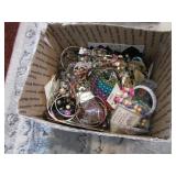 box of costume jewelry