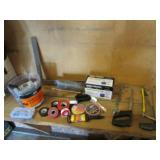 saws,paint mixing cup,string,tape & items