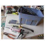blue tote,caulking gun,cutters,prybar & items