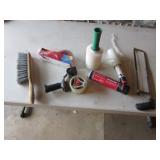 tube of grease,plastic rolls,tape & brush