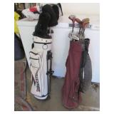 2 bags of golfclubs