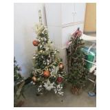 2- 4 ft christmas trees & decorations