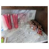 9 hull mugs,2 cranberry vases,glassware