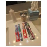 new toothbrushes & bathroom items
