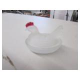 small glass hen on nest