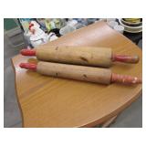 2 red handle rolling pins