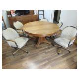 antique oak kitchen table w/4 roll chairs