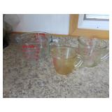 3 pyrex measure cups(1 is bigger)