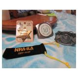 2 belt buckles,empty bag & badge