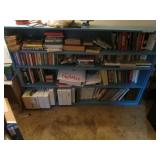 blue bookshelf & all books & items on it