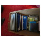 box of notebooks