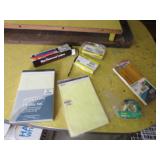 notepads,pencils,staples,tape & light