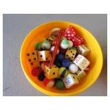 marbles & dice in yellow container