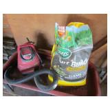 small shop vac & half bag of turf builder