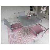 patio table w/4 chairs & rug