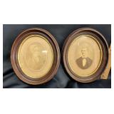 deep walnut oval framed portraits