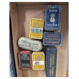 Collection of Automotive Light Bulb Tins and Assor