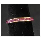 Unmarked 14K yellow gold and Ruby band ring