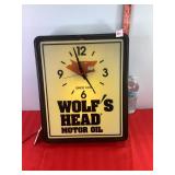 Wolfs Head Motor Oil Lighted Clock Wolfs Head Motor Oil Lighted Clock
