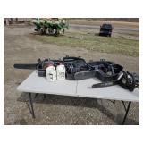 Lot of 4 Chainsaws & 2 Gal. Of Bar and Chain Oil