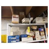 3 shelves of new and used parts